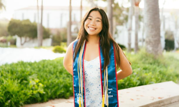 Student Iliana Chen poses for graduation photo